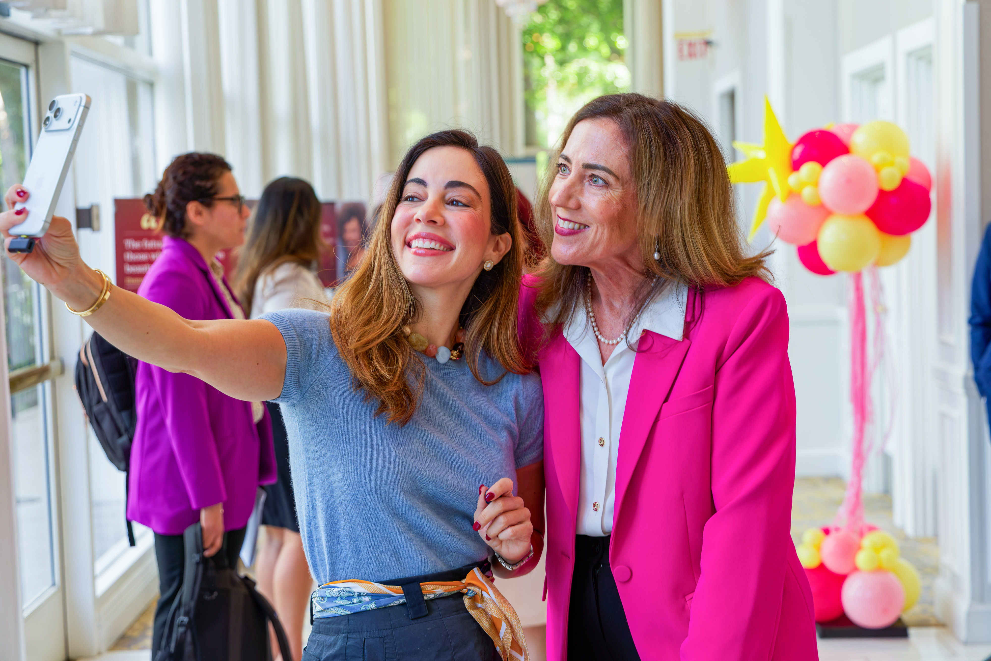 Keynote speaker Mariana Atencio taking a selfie with Dr. Debra Duardo
